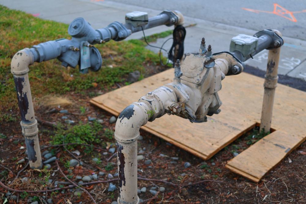 Commercial, residential backflow prevention water system