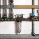 Group of backwater valve or backflow shut off valve in service room of building.
